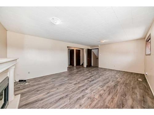 250070 Township Road 434, Rural Ponoka County, AB - Indoor Photo Showing Other Room With Fireplace