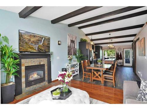 8 Archibald Crescent, Red Deer, AB - Indoor Photo Showing Living Room With Fireplace