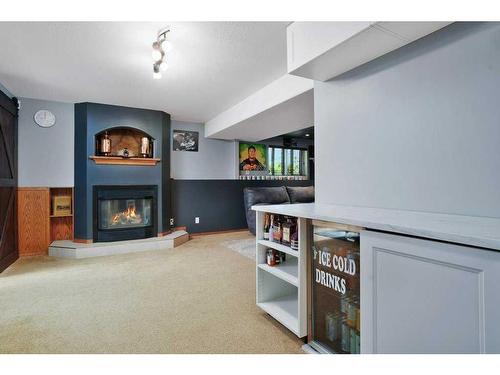 8 Archibald Crescent, Red Deer, AB - Indoor With Fireplace