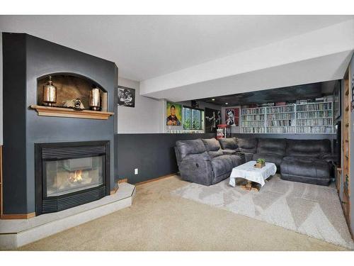 8 Archibald Crescent, Red Deer, AB - Indoor Photo Showing Living Room With Fireplace