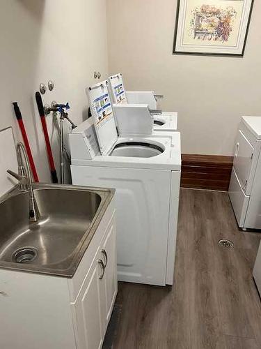 1-4747 50 Street, Sylvan Lake, AB - Indoor Photo Showing Laundry Room