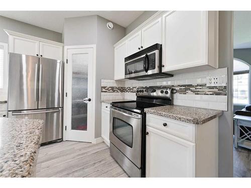 112 Archer Drive, Red Deer, AB - Indoor Photo Showing Kitchen With Upgraded Kitchen