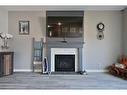 112 Archer Drive, Red Deer, AB  - Indoor Photo Showing Living Room With Fireplace 