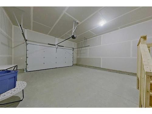 74 Palmer Circle, Blackfalds, AB - Indoor Photo Showing Garage