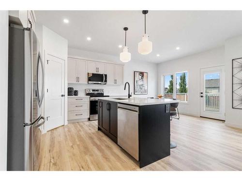 74 Palmer Circle, Blackfalds, AB - Indoor Photo Showing Kitchen With Stainless Steel Kitchen With Upgraded Kitchen