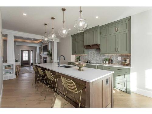 7 Songbird Green, Sylvan Lake, AB - Indoor Photo Showing Kitchen With Upgraded Kitchen