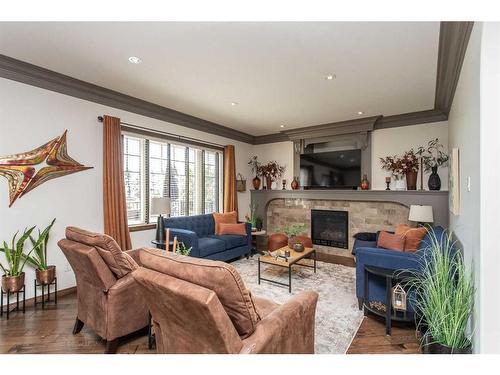 152 Vanson Close, Red Deer, AB - Indoor Photo Showing Living Room With Fireplace