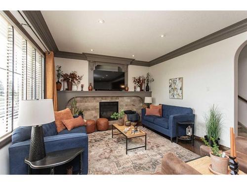 152 Vanson Close, Red Deer, AB - Indoor Photo Showing Living Room With Fireplace