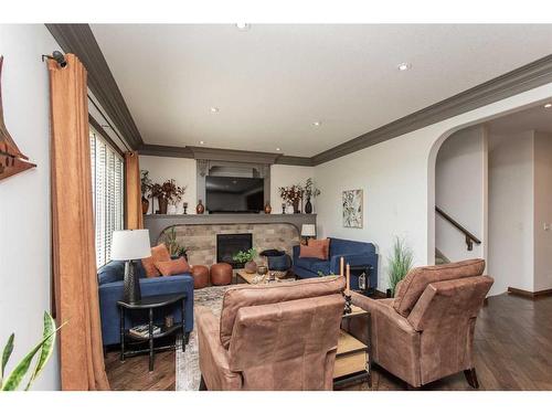 152 Vanson Close, Red Deer, AB - Indoor Photo Showing Living Room With Fireplace