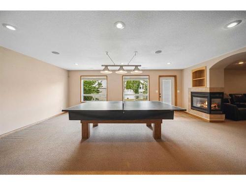 69 Alberts Close, Red Deer, AB - Indoor Photo Showing Other Room With Fireplace