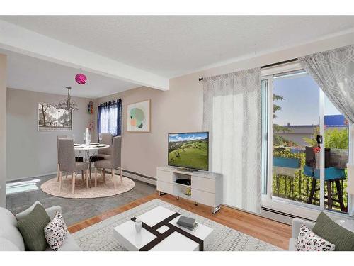 11-14, 21-24, 31-34-4932 48 Street, Rocky Mountain House, AB - Indoor Photo Showing Living Room