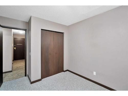 11-14, 21-24, 31-34-4932 48 Street, Rocky Mountain House, AB - Indoor Photo Showing Bedroom