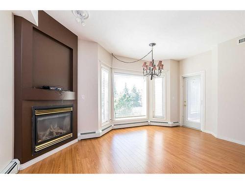 226-5300 48 Street, Red Deer, AB - Indoor With Fireplace