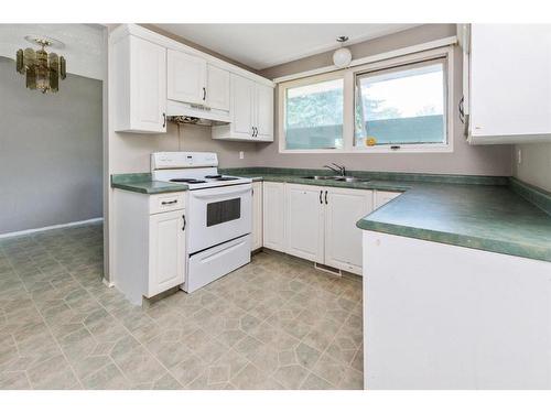 5922 West Park Crescent, Red Deer, AB - Indoor Photo Showing Kitchen With Double Sink