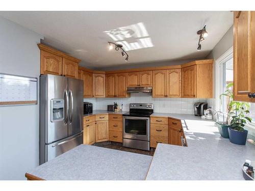 51 Olympic Green, Red Deer, AB - Indoor Photo Showing Kitchen With Stainless Steel Kitchen