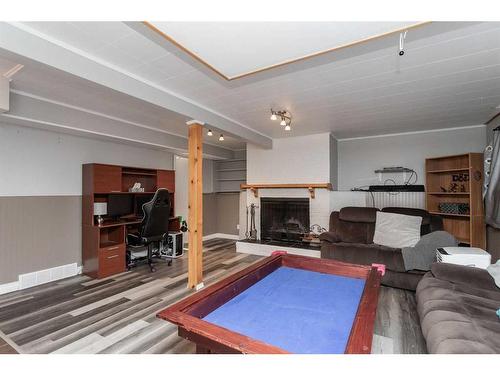 51 Olympic Green, Red Deer, AB - Indoor Photo Showing Living Room With Fireplace