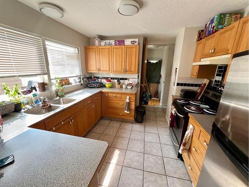 66 Sherwood Crescent, Red Deer, AB - Indoor Photo Showing Kitchen With Double Sink