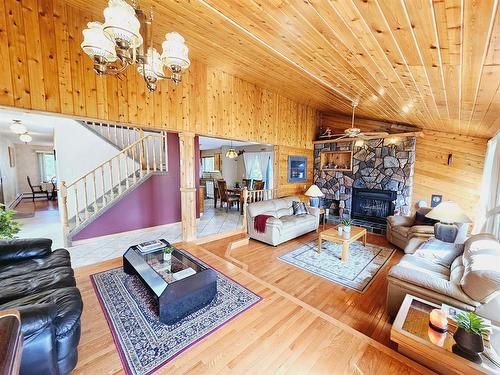 916 & 920 6 Street Se, Slave Lake, AB - Indoor Photo Showing Living Room With Fireplace