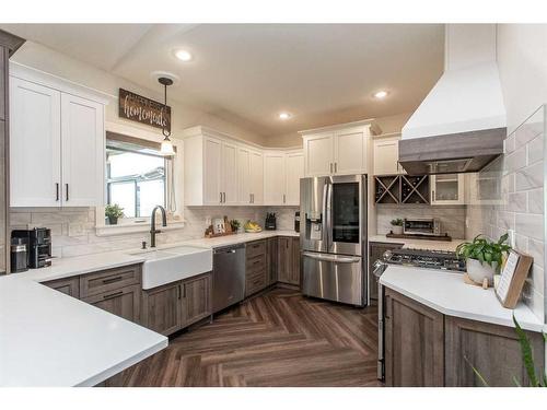 7024 Cobb Street, Lacombe, AB - Indoor Photo Showing Kitchen With Stainless Steel Kitchen