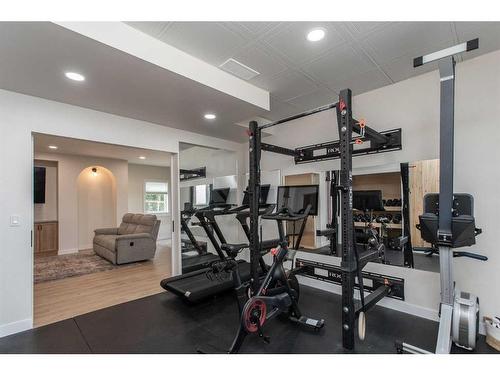 7024 Cobb Street, Lacombe, AB - Indoor Photo Showing Gym Room