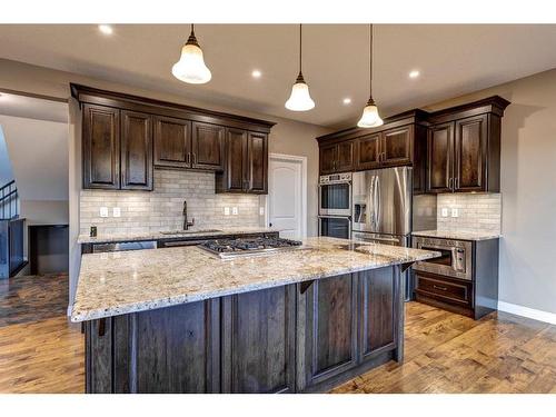 52 Toal Close, Red Deer, AB - Indoor Photo Showing Kitchen With Stainless Steel Kitchen With Upgraded Kitchen