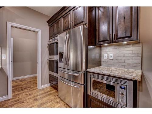 52 Toal Close, Red Deer, AB - Indoor Photo Showing Kitchen With Stainless Steel Kitchen