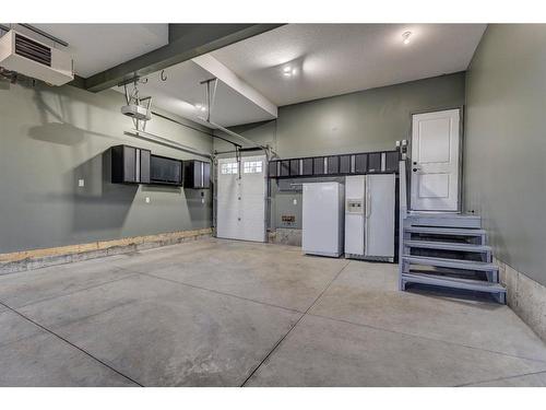 52 Toal Close, Red Deer, AB - Indoor Photo Showing Garage