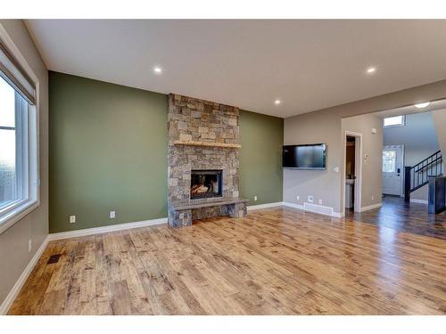 52 Toal Close, Red Deer, AB - Indoor Photo Showing Living Room With Fireplace