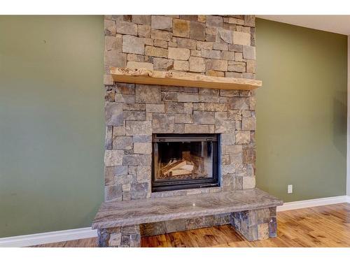 52 Toal Close, Red Deer, AB - Indoor Photo Showing Living Room With Fireplace