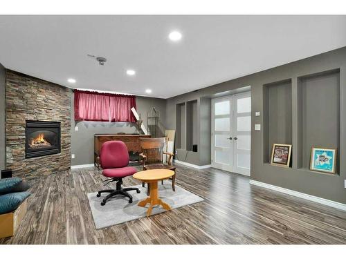 6006 44 Street Crescent, Innisfail, AB - Indoor With Fireplace