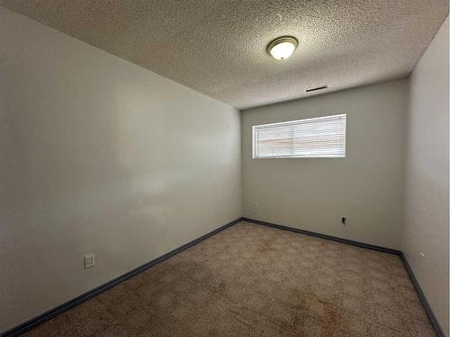 4016 39A Avenue Close, Ponoka, AB - Indoor Photo Showing Other Room