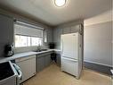 4016 39A Avenue Close, Ponoka, AB  - Indoor Photo Showing Kitchen With Double Sink 