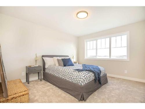 242 Halifax Close, Penhold, AB - Indoor Photo Showing Bedroom