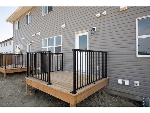 242 Halifax Close, Penhold, AB - Outdoor With Deck Patio Veranda With Exterior