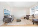 242 Halifax Close, Penhold, AB  - Indoor Photo Showing Living Room 