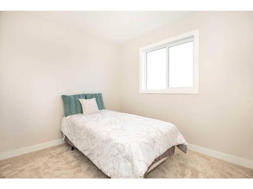 246 Halifax Close, Penhold, AB - Indoor Photo Showing Bedroom