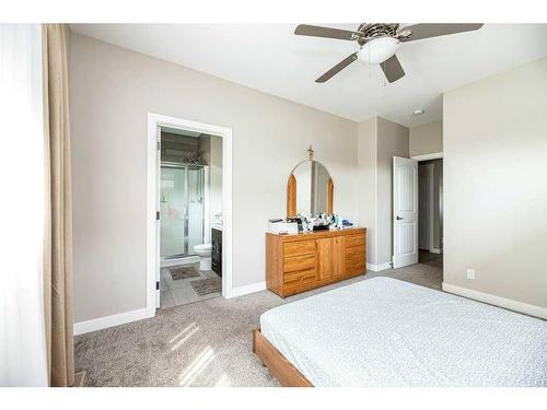 150 Livingston Close, Red Deer, AB - Indoor Photo Showing Bedroom