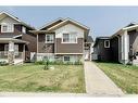 150 Livingston Close, Red Deer, AB  - Outdoor With Deck Patio Veranda With Facade 