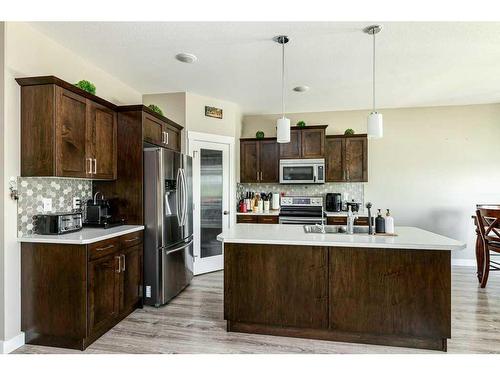 150 Livingston Close, Red Deer, AB - Indoor Photo Showing Kitchen With Double Sink