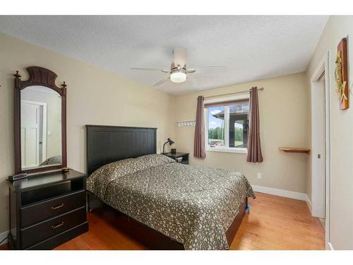 6071-25054 South Pine Lake Road, Rural Red Deer County, AB - Indoor Photo Showing Bedroom