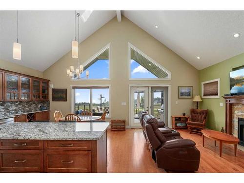 6071-25054 South Pine Lake Road, Rural Red Deer County, AB - Indoor Photo Showing Living Room With Fireplace