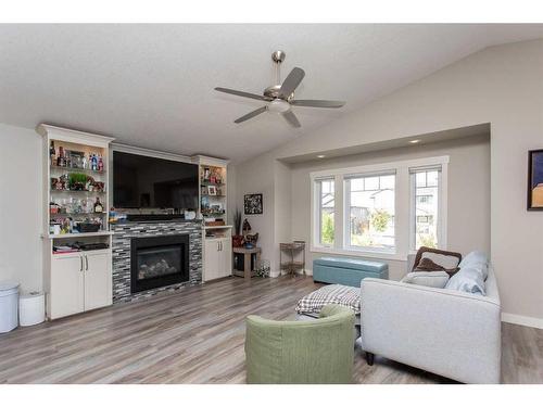 393 Timothy Drive, Red Deer, AB - Indoor Photo Showing Living Room With Fireplace