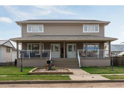 5020A 49 Street, Killam, AB - Outdoor With Deck Patio Veranda With Facade