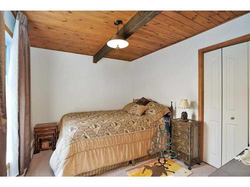 201, 35276 Range Road 10, Rural Red Deer County, AB - Indoor Photo Showing Bedroom