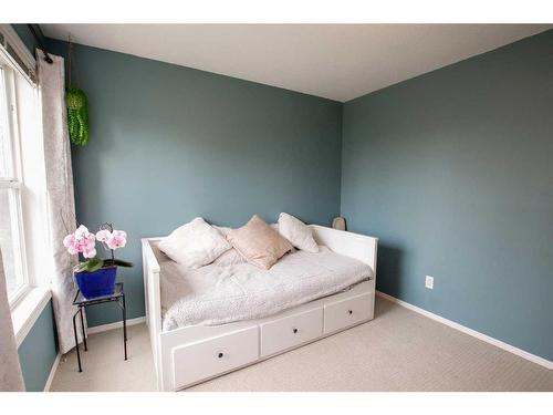 14 Lewis Close, Red Deer, AB - Indoor Photo Showing Bedroom