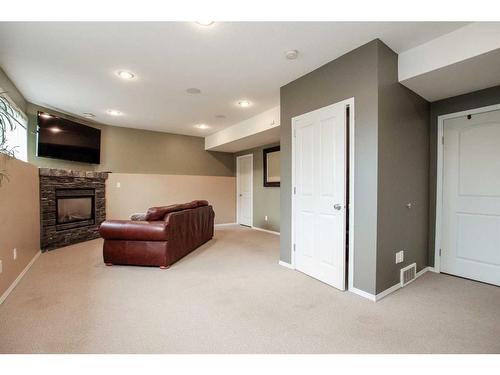 14 Lewis Close, Red Deer, AB - Indoor With Fireplace