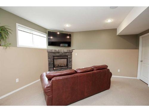 14 Lewis Close, Red Deer, AB - Indoor Photo Showing Other Room With Fireplace