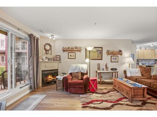 131-18 Averill Street, Red Deer, AB - Indoor Photo Showing Living Room With Fireplace