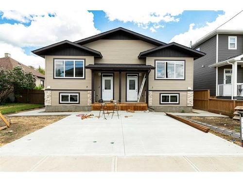 2-5135 53 Street, Lacombe, AB - Outdoor With Facade