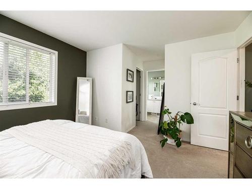 61 Arnold Close, Red Deer, AB - Indoor Photo Showing Bedroom